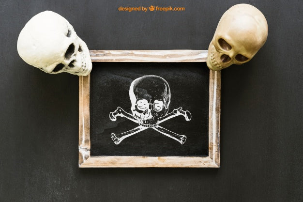 Free Halloween Slate Mockup With Two Skulls Psd