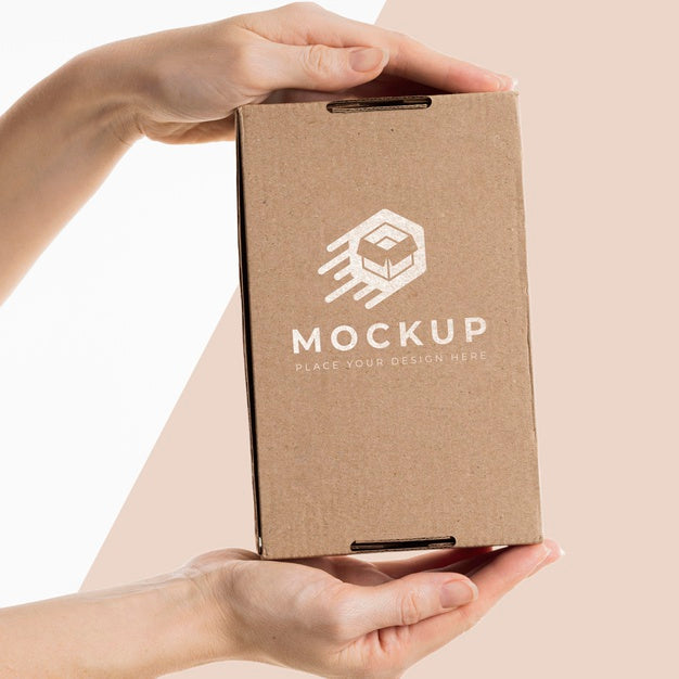 Free Hand Holding A Box Mock-Up Psd