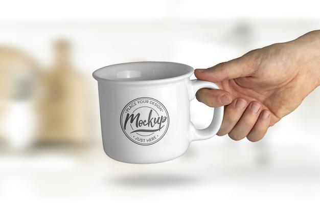 Free Hand Holding A Mug Mockup Psd