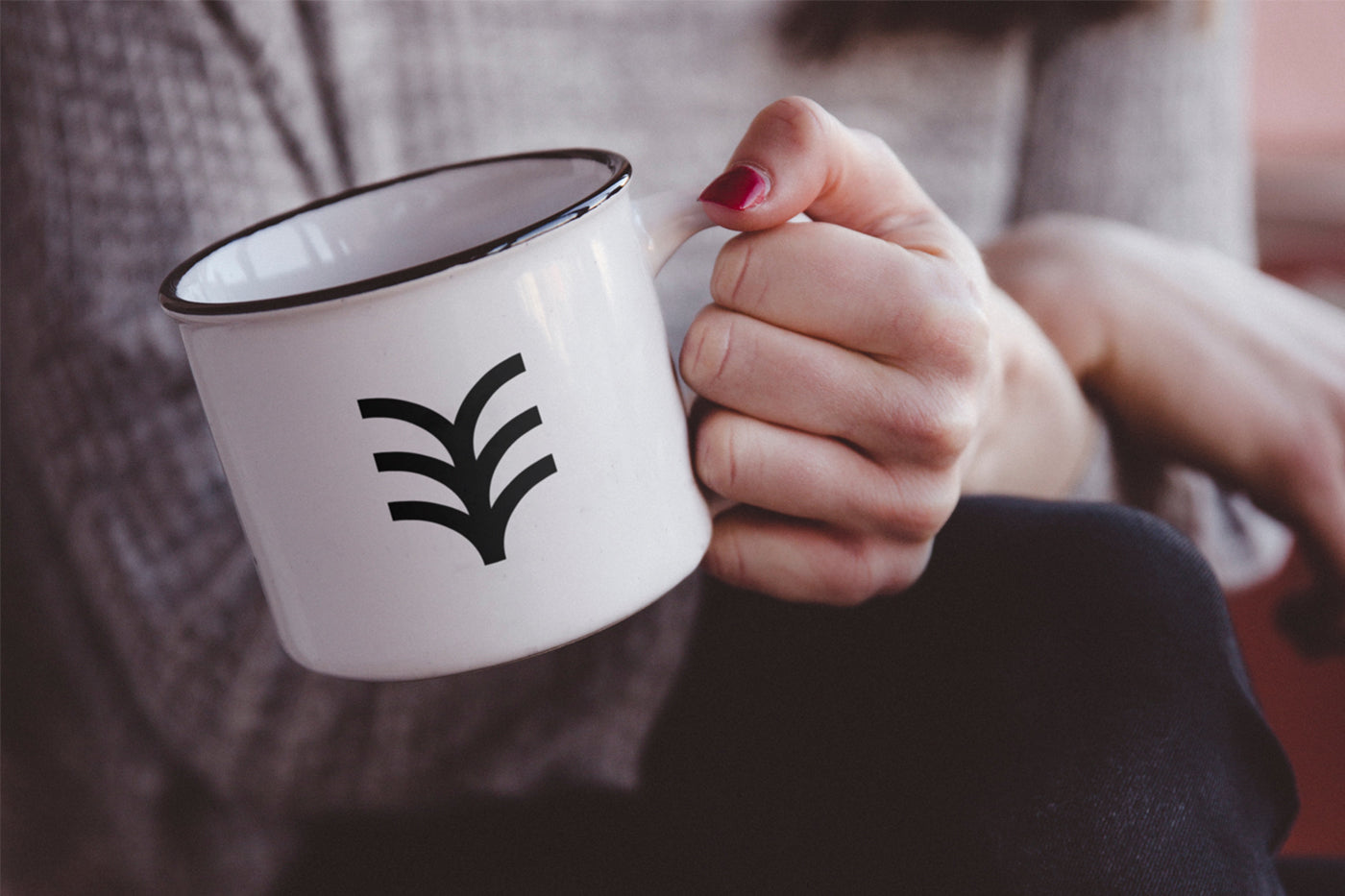 Free Hand Holding Metal Mug Mockup