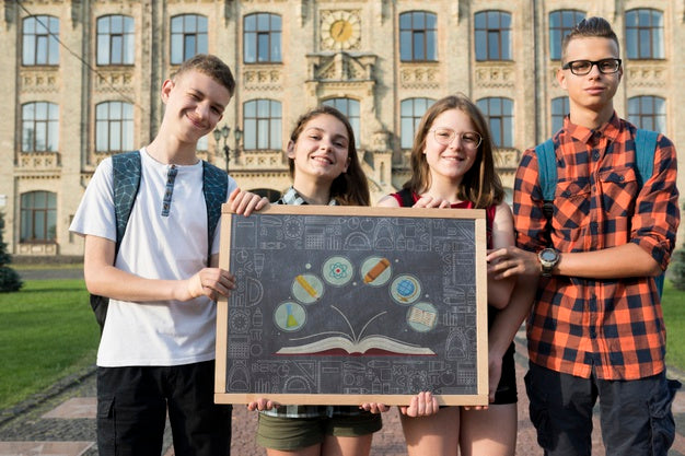 Free Happy Student Holding Blackboard Mock-Up Psd