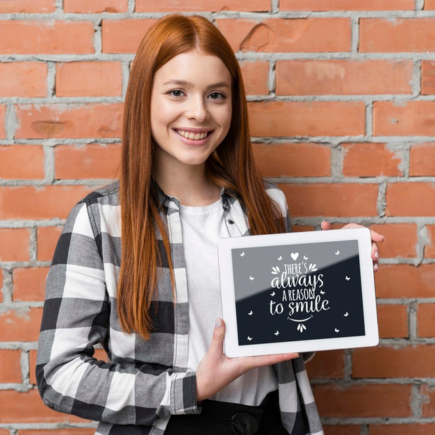 Free Happy Woman Holding Tablet Mock-Up Psd