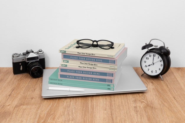 Free High Angle Books, Camera And Glasses Psd