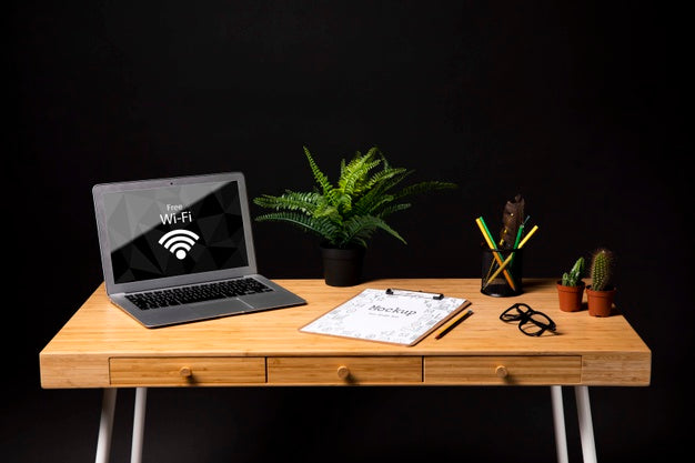 Free Laptop Mock-Up In Office Psd