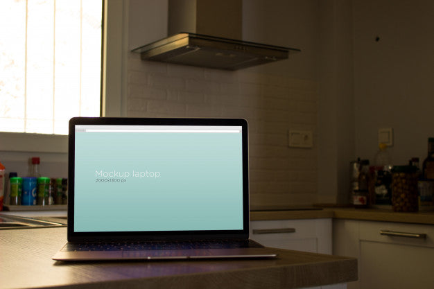 Free Laptop Mockup In Kitchen Psd