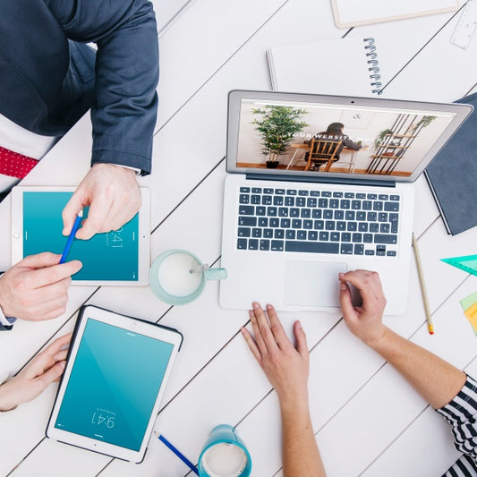 Free Laptop Mockup On Office Desk Psd