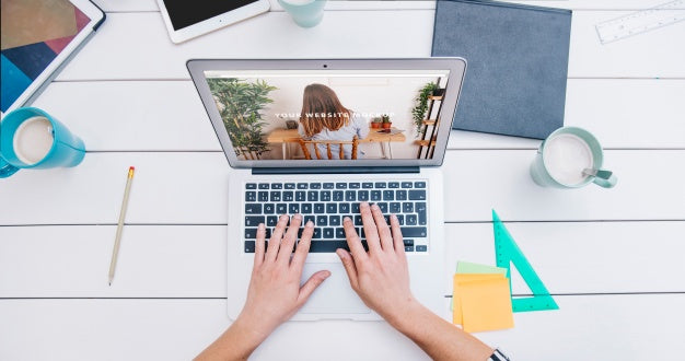 Free Laptop Mockup On Office Desk Psd