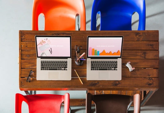 Free Laptop Mockup On Wooden Table Psd