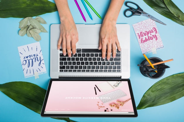 Free Laptop Mockup With Person Typing On Keyboard Psd