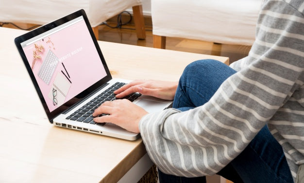 Free Laptop Mockup With Woman Working At Home Psd