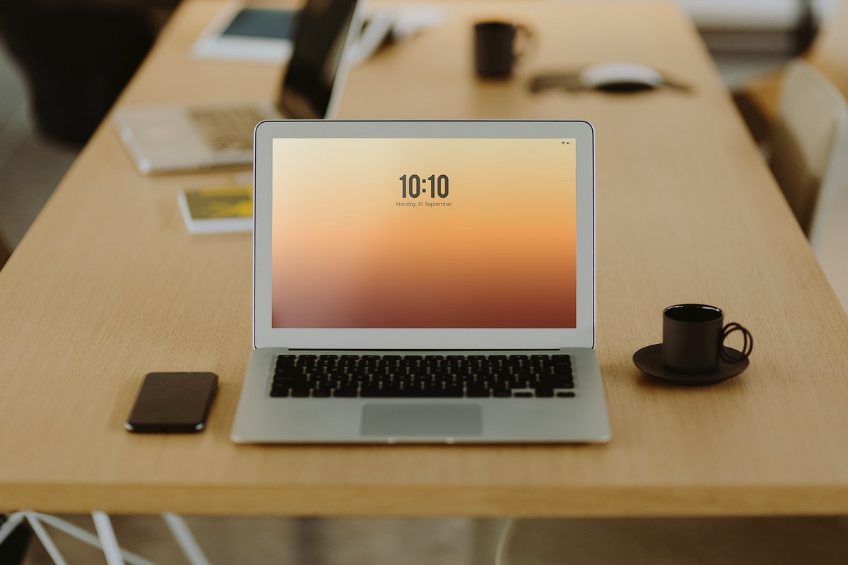 Free Laptop On A Wooden Office Table