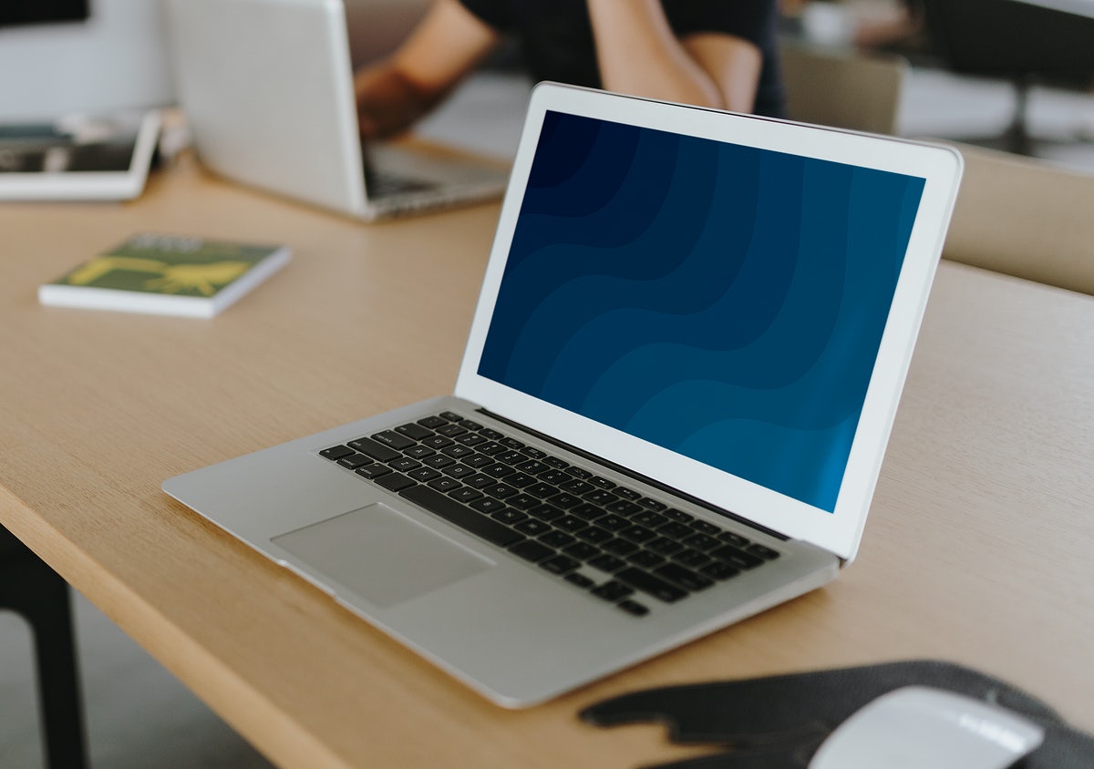 Free Laptop On A Wooden Table