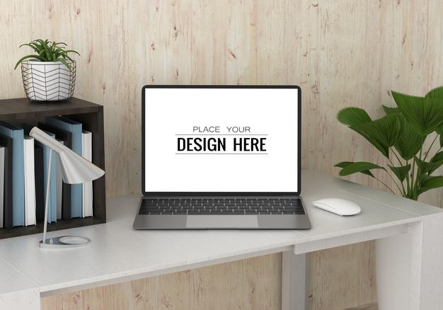 Free Laptop On Desk In Work Space Psd Mockup Psd