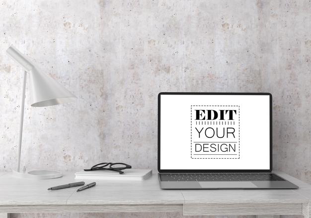 Free Laptop On Desk In Work Space Psd Mockup Psd