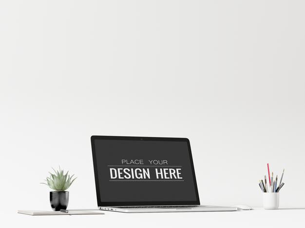 Free Laptop On Desk In Work Space Psd Mockup Psd