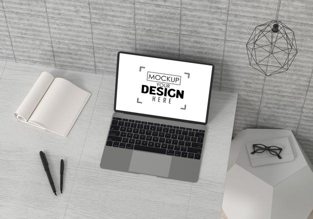 Free Laptop On Desk In Work Space Psd Mockup Psd