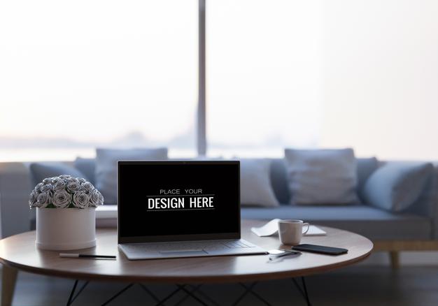 Free Laptop On Desk In Workspace Mockup Psd