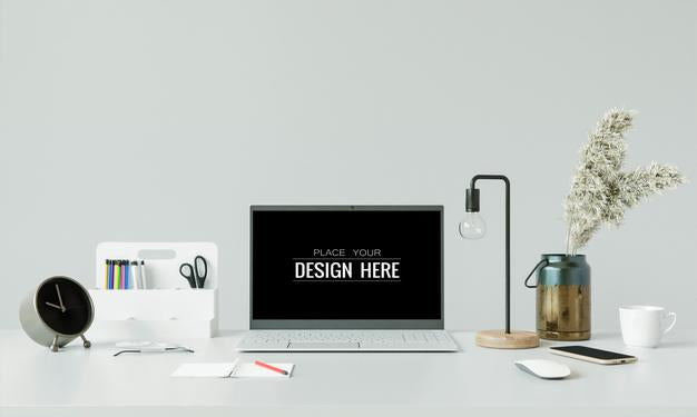 Free Laptop On Desk In Workspace Mockup Psd