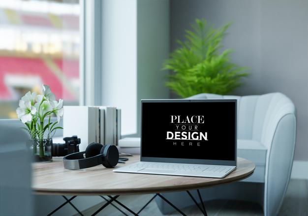 Free Laptop On Desk In Workspace Mockup Psd