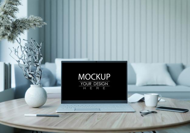 Free Laptop On Desk In Workspace Mockup Psd