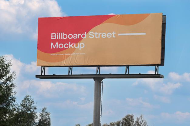 Free Large Billboard Mockup On Blue Sky With Clouds Psd