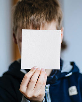 Free Little Boy Showing Square Card Mockup Psd