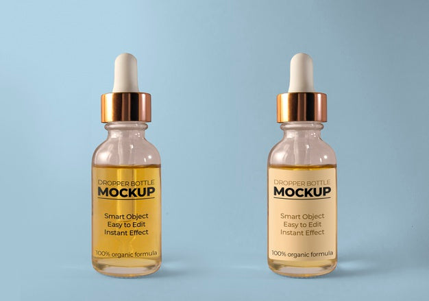 Free Little Colored Dropped Bottle Mockup Psd