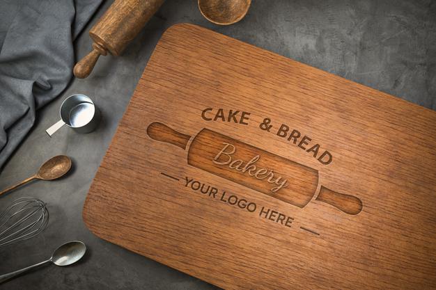 Free Logo Mockup On Wooden Cutting Board Psd