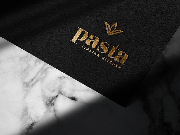 Free Luxury Embossed Gold Logo Mockup On Black Paper Psd