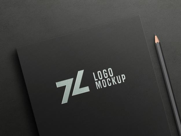 Free Luxury Silver Foil Logo Mockup On Black Paper Psd