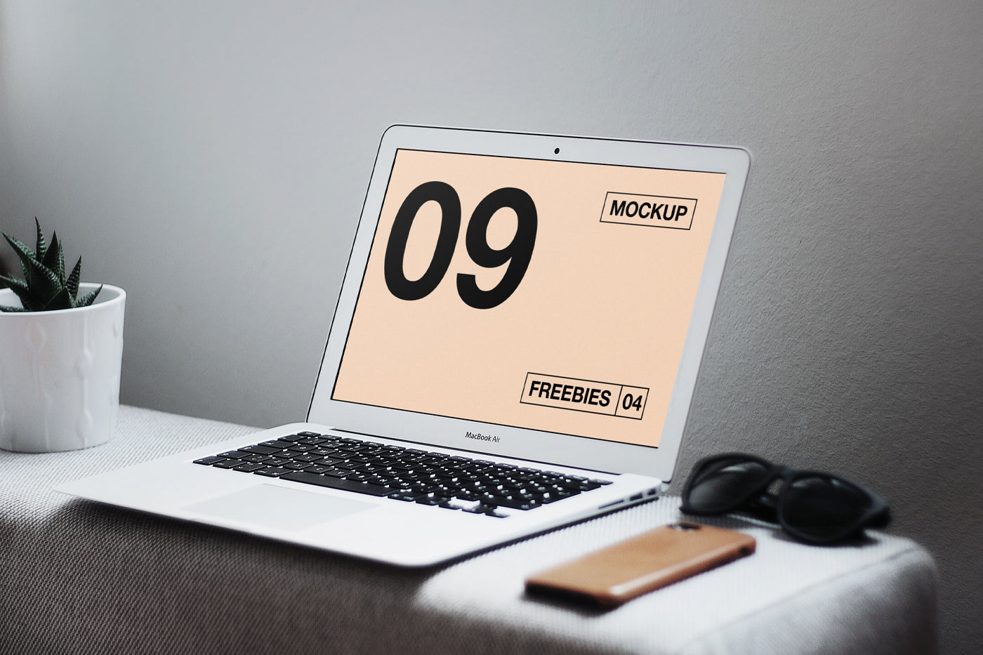 Free Macbook Air On Table Mockup