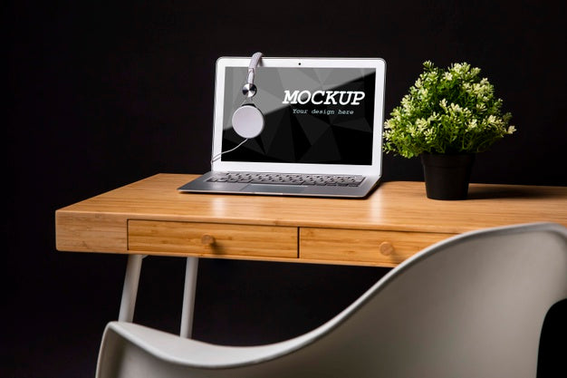 Free Macbook Mock-Up With Headphones Psd