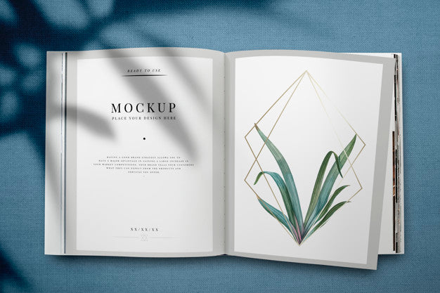 Free Magazine Mockup With Leaves And Golden Frame Psd