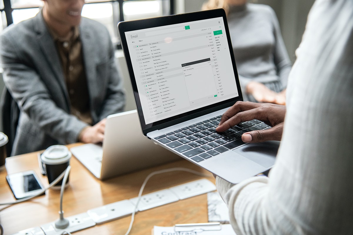 Free Man Checking His Email On A Laptop