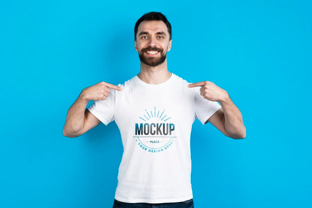 Free Man Showing Mock-Up Shirt Psd