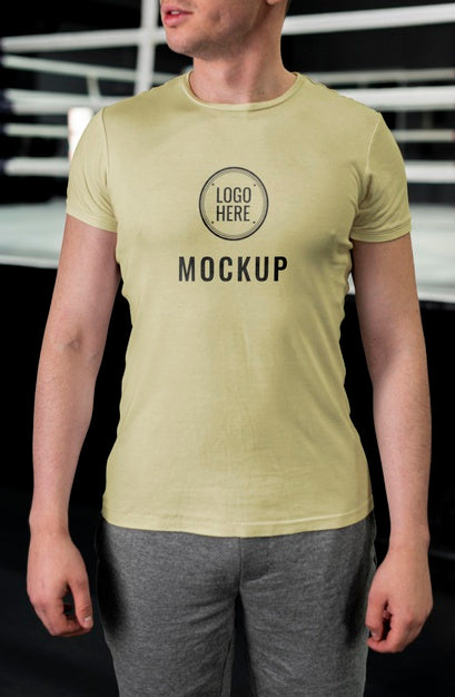 Free Man Wearing Boxing T-Shirt Mock-Up Psd