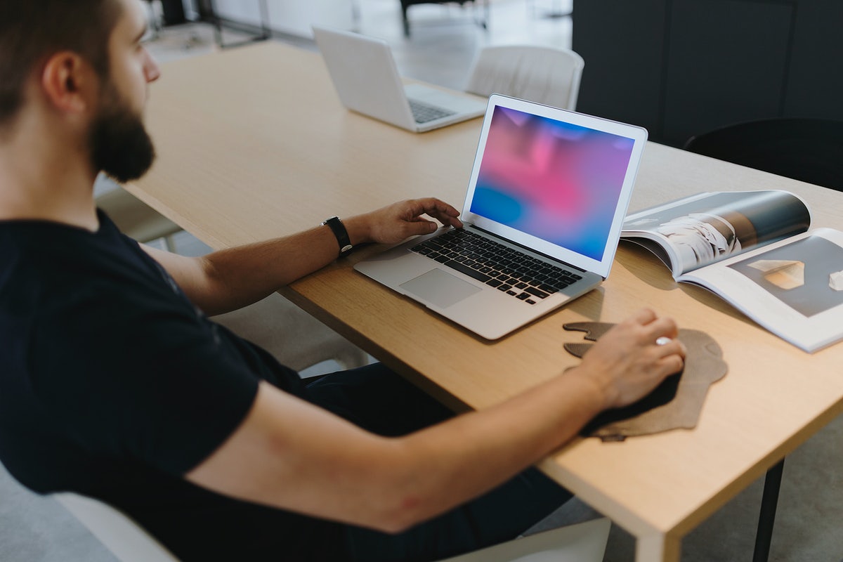 Free Man Working On His Laptop