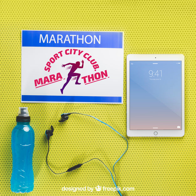 Free Marathon Mockup With Tablet Psd