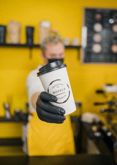 Free Mid Shot Barista Holding Coffee Cup Mock-Up Psd