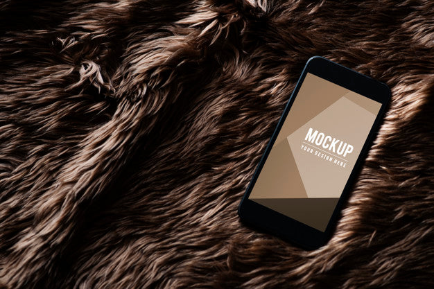 Free Mobile Phone Screen Mockup On Fur Surface Psd