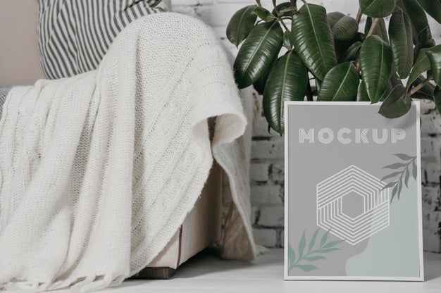 Free Mock Up Frame Next To Plant Psd