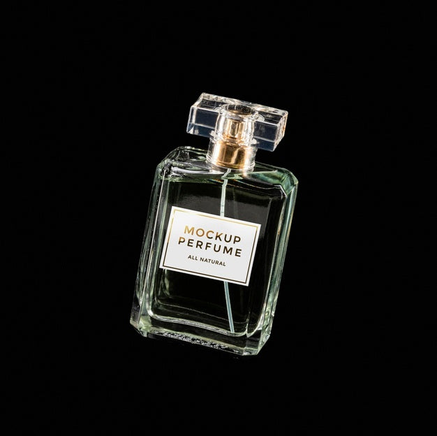 Free Mock-Up Of Clear Bottle Of Perfume On Black Background Psd