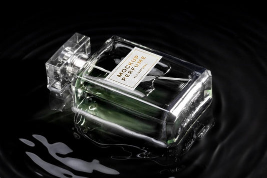 Free Mock-Up Of Glass Bottle Of Perfume With Clear Water Psd