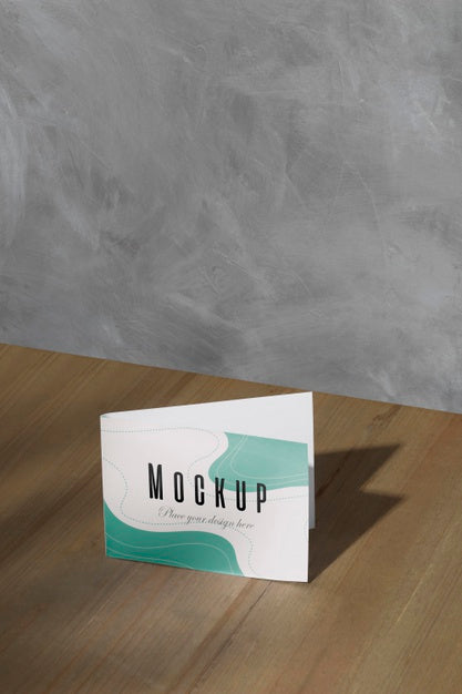 Free Mockup Card On The Table With Shadows Psd