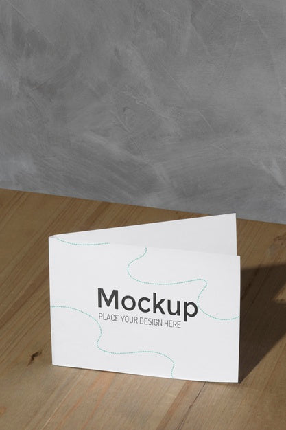 Free Mockup Card On The Table With Shadows Psd