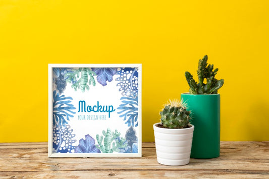 Free Mockup Frame Beside Plants Psd