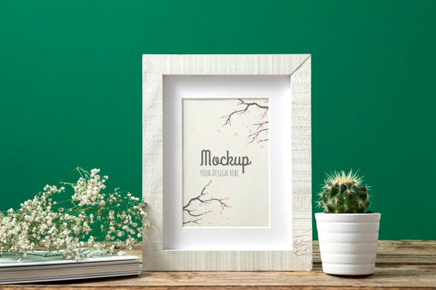 Free Mockup Frame Beside Plants Psd