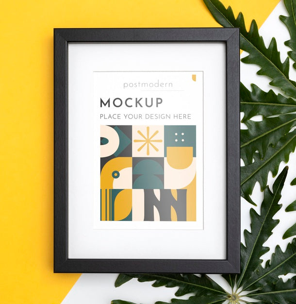 Free Mockup Frame On Wall With Leaves Psd