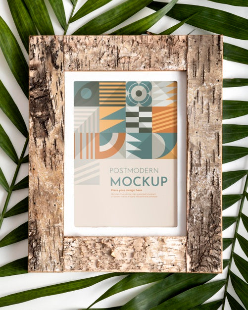 Free Mockup Frame On Wall With Leaves Psd