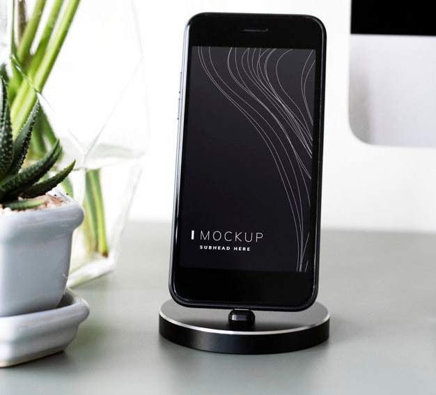 Free Mockup Of A Mobile Phone On A Stand Psd